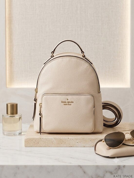 kate spade Handbags - Kate Spade Jackson Street Keleigh Cream Leather Mini Backpack